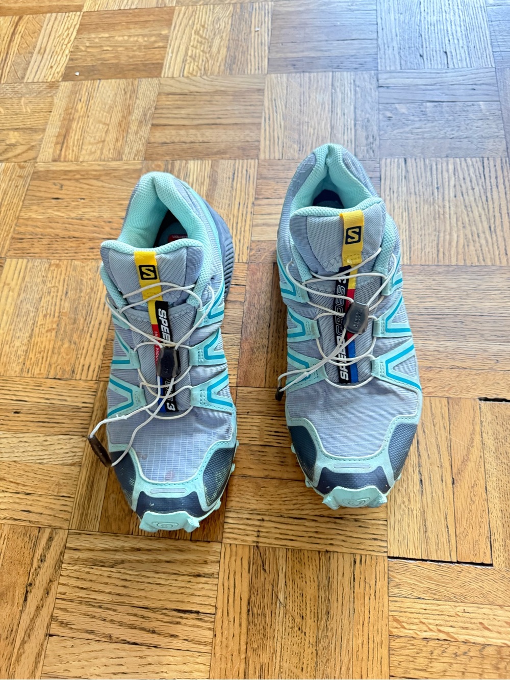 Salomon Trail Running Shoes in Light Blue and Teal